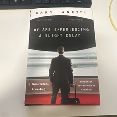 We Are Experiencing a Slight Delay by Gary Janetti, Hardcover, Travel, 2024