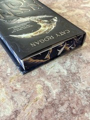 Deluxe limited edition Kissed by the God Signed Hardcover w/ Dust Jacket