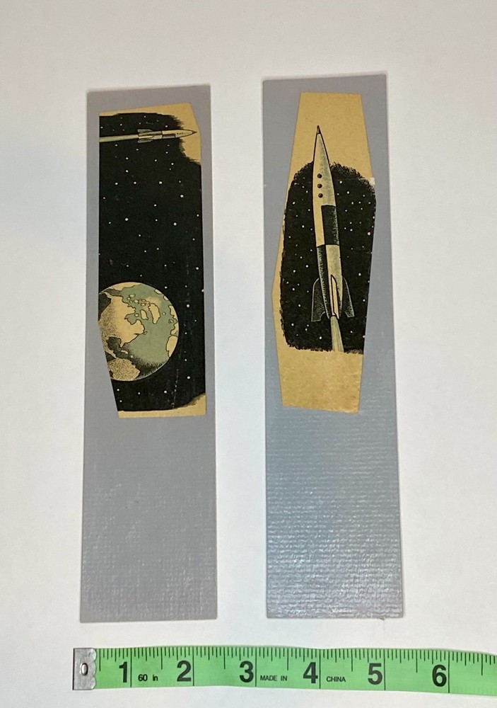 2 handmade space age book cutout bookmarks, roughly 2.5 in x 9 in