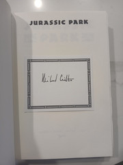 Jurassic Park 1st Printing and Gift Edition, both signed Crichton