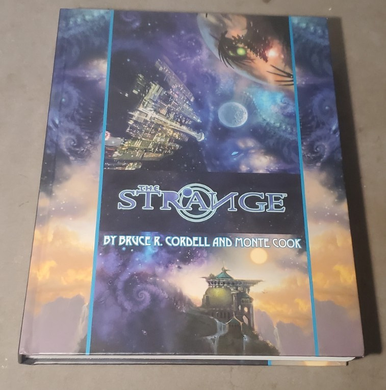 The Strange – Bruce Cordell, Monte Cook RPG Hardcover Designer Art Fantasy